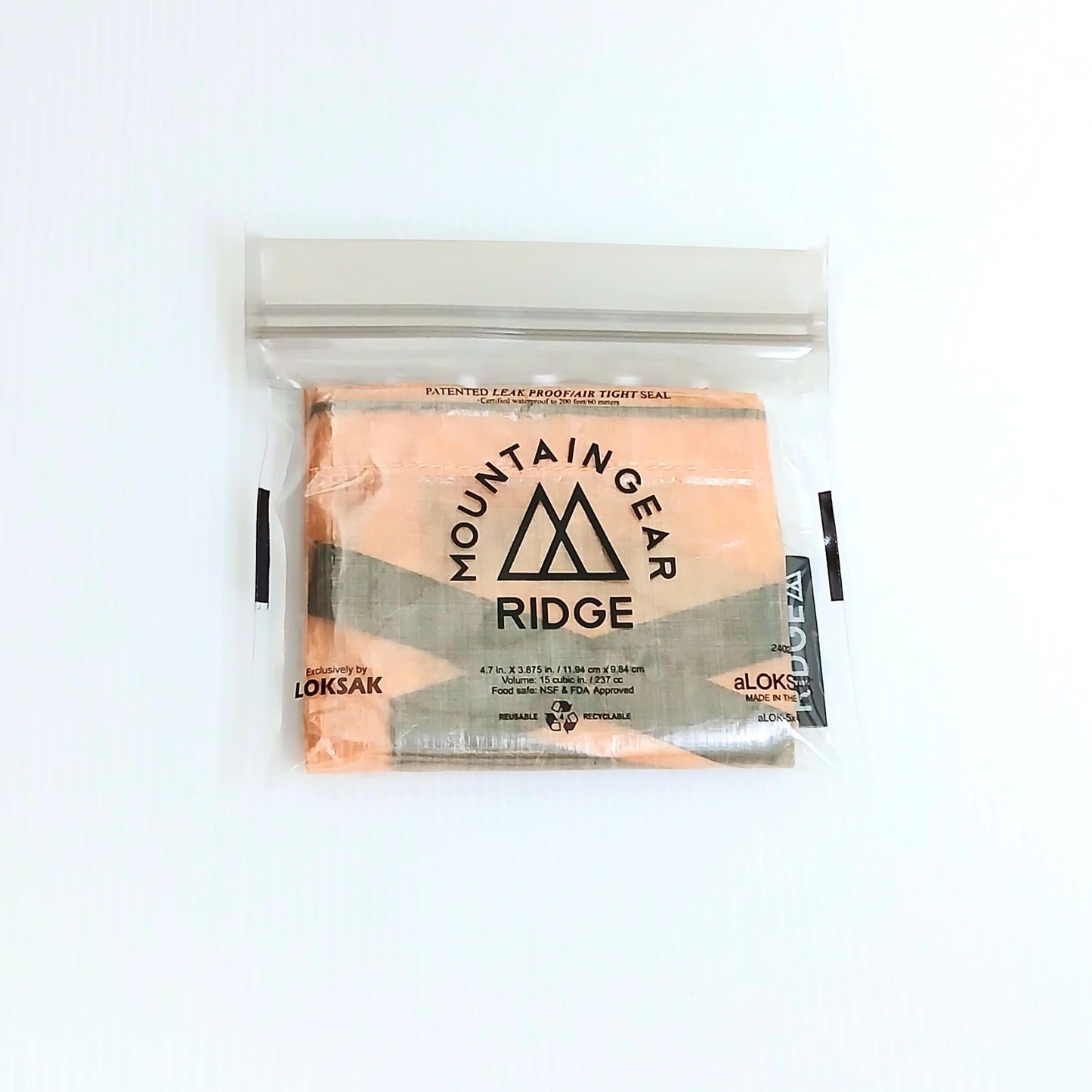 RIDGE MOUNTAIN GEAR Stuff Sack スタッフサック Copper Clay 本体を折りたたんで付属のaLOKSAK XXSに収納した状態の実物写真 - 山道具とULギアのお店 Ascend Lite