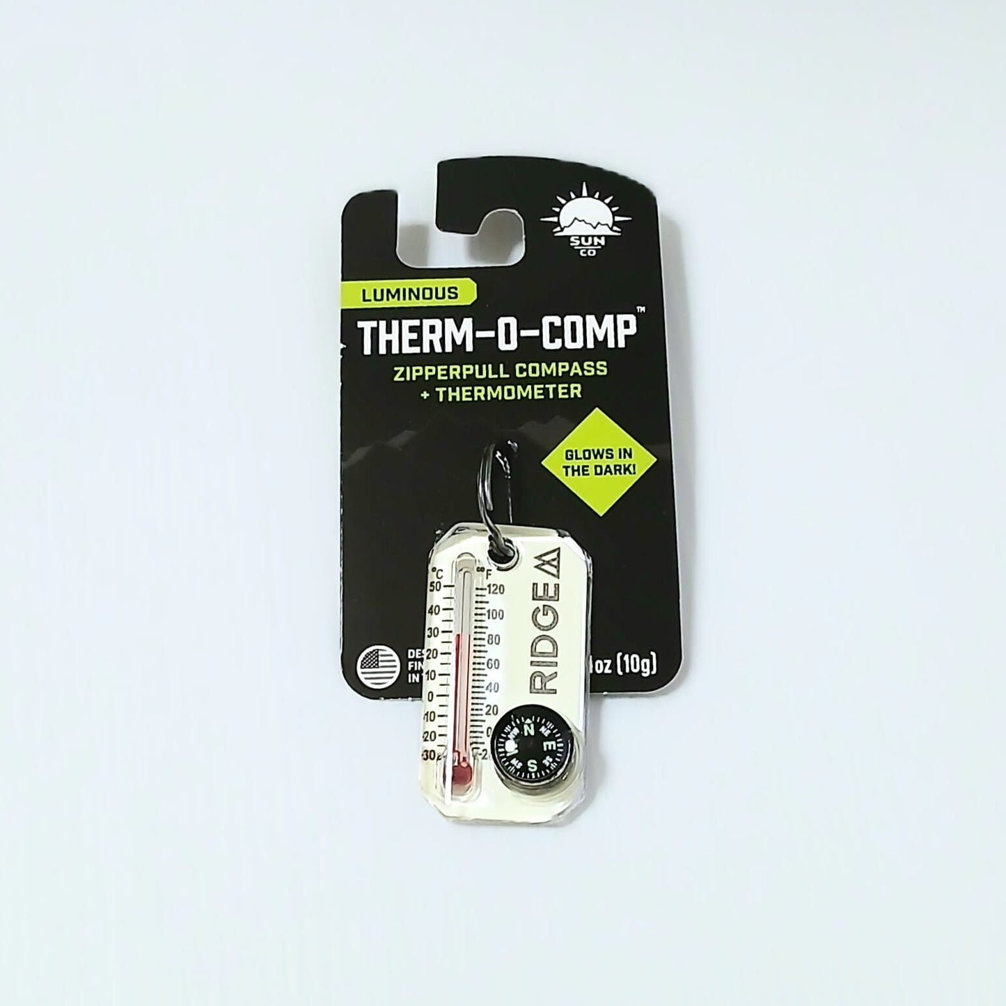 RIDGE MOUNTAIN GEAR Therm-o-compass サーモコンパス LumaGage（蓄光）パッケージ台紙に取り付けた状態の実物写真 - 山道具とULギアのお店 Ascend Lite