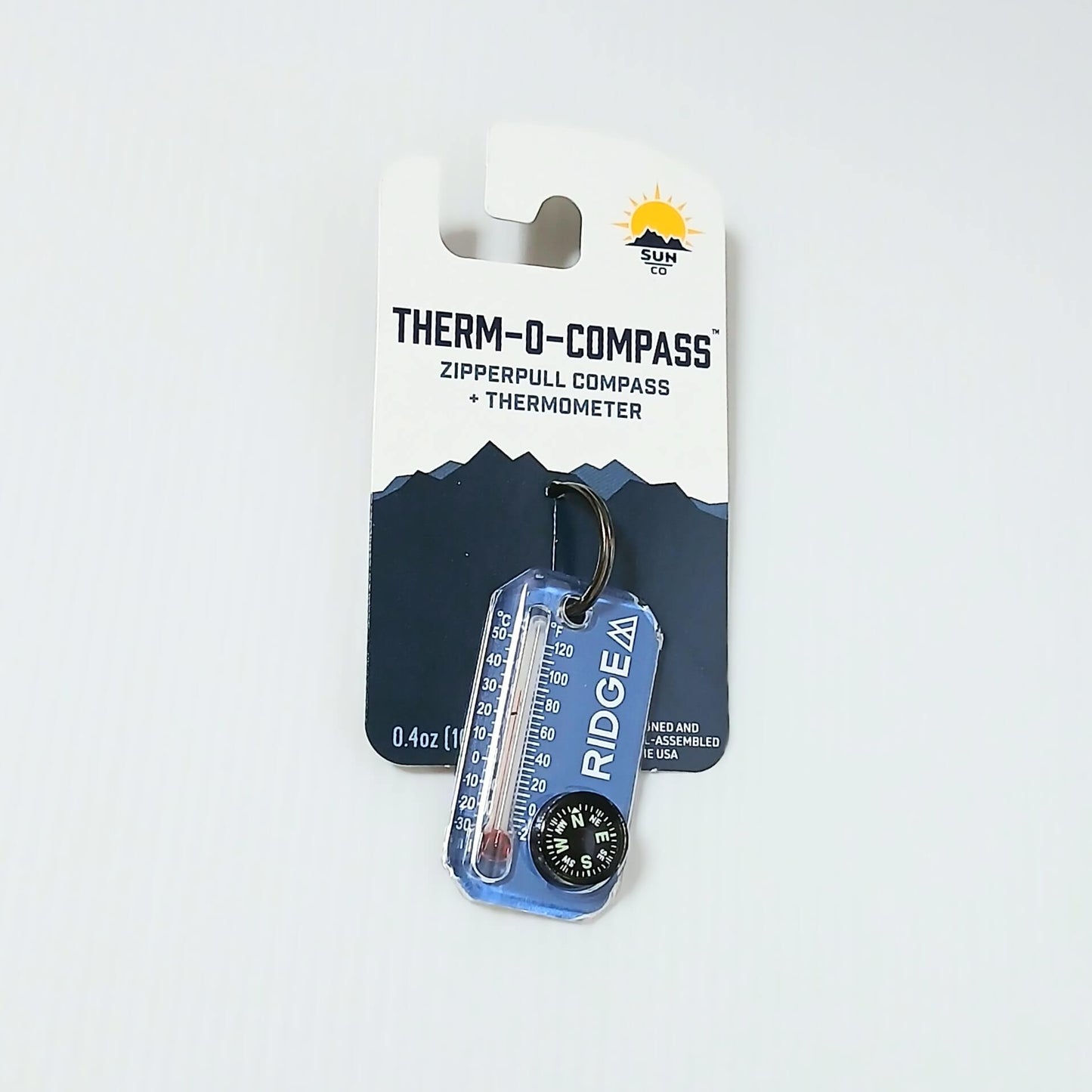 RIDGE MOUNTAIN GEAR Therm-o-compass サーモコンパス Palace Blue パッケージ台紙に取り付けた状態の実物写真 - 山道具とULギアのお店 Ascend Lite