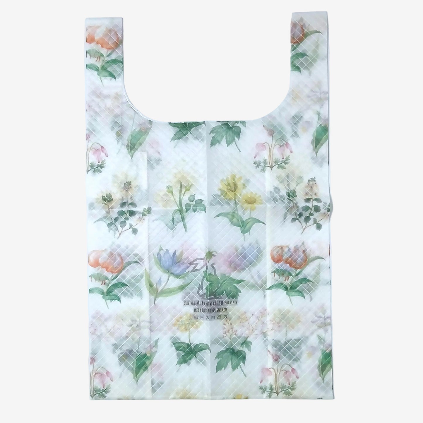 High Tail Designs TX Large Shopping Bag ショッピングバッグ L Mountain Flowers White（Flower of the Mountain） 半透明の白地にユリ・黄花・青い高山植物のボタニカル画を並べた柄。中央下のアーティストクレジット印字と、格子状の折りジワが残る平置き正面全体の実物写真 - 山道具とULギアのお店 Ascend Lite