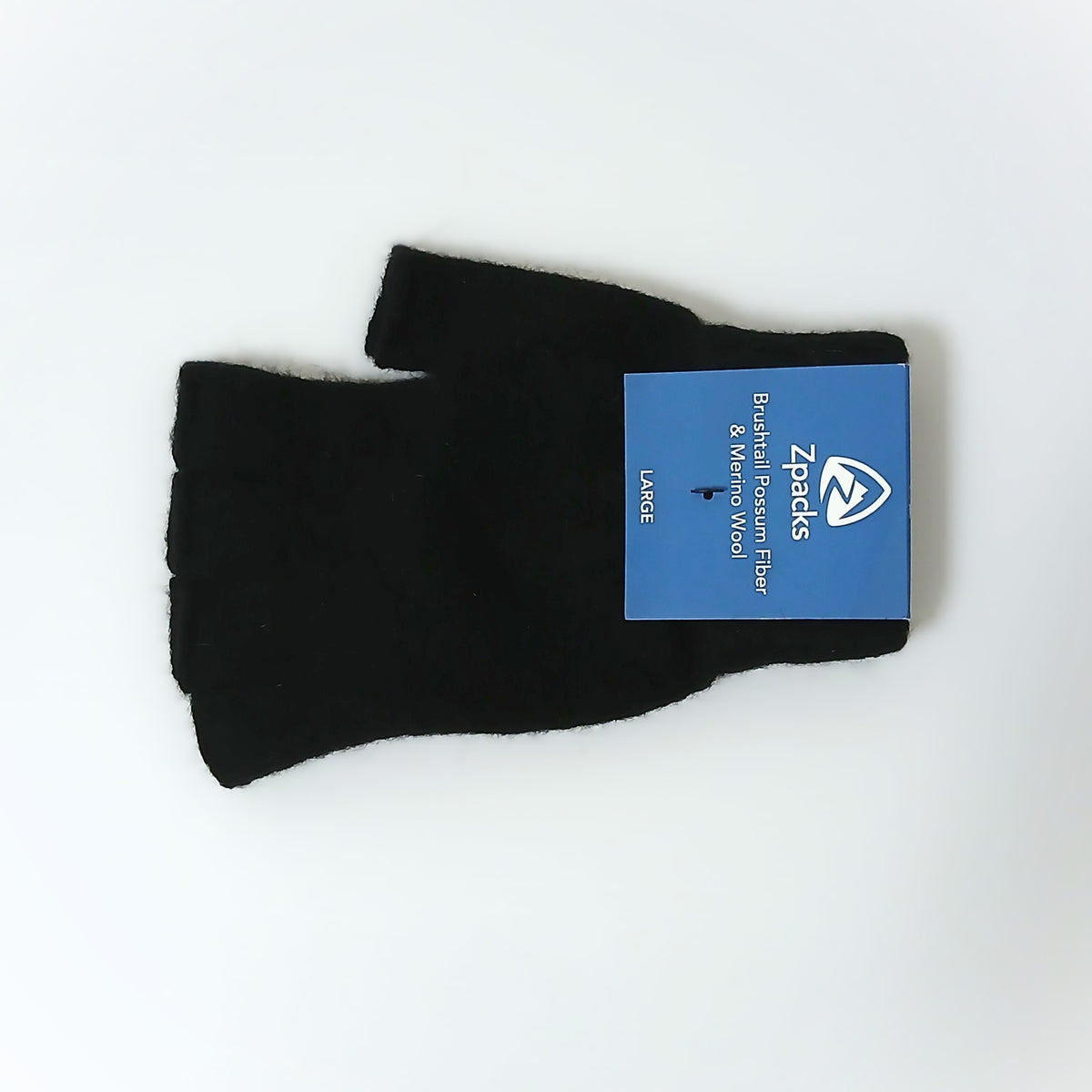 Zpacks Fingerless Brushtail Possum Gloves フィンガーレスブラシテールポッサムグローブ L - パッケージのタグ（LARGE）が付いた片手を平置きした全体の実物写真 - 山道具とULギアのお店 Ascend Lite